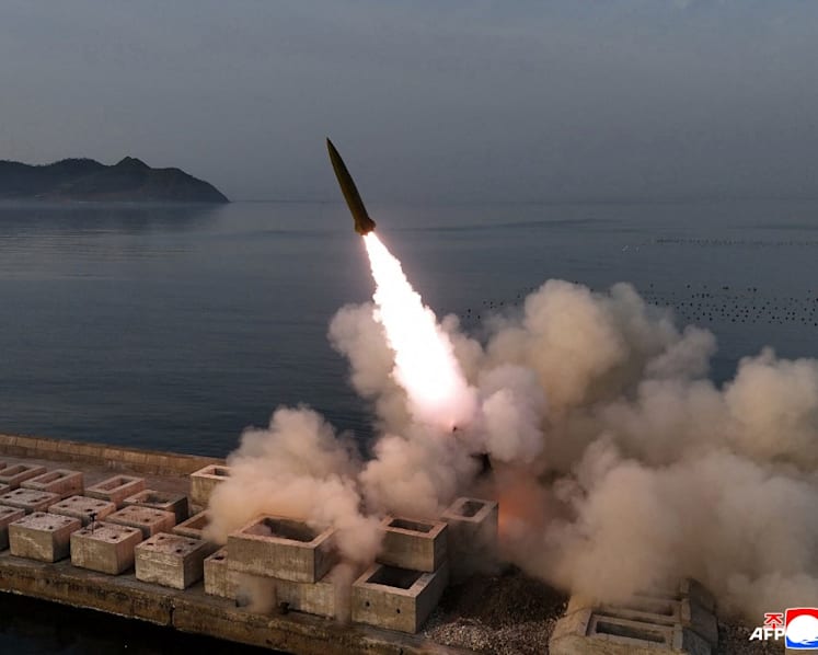North Korean leader Kim oversaw test of missiles with cluster warheads