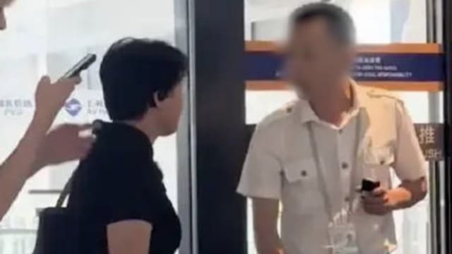 行李箱超出两厘米被收128元 乘客大闹上海机场