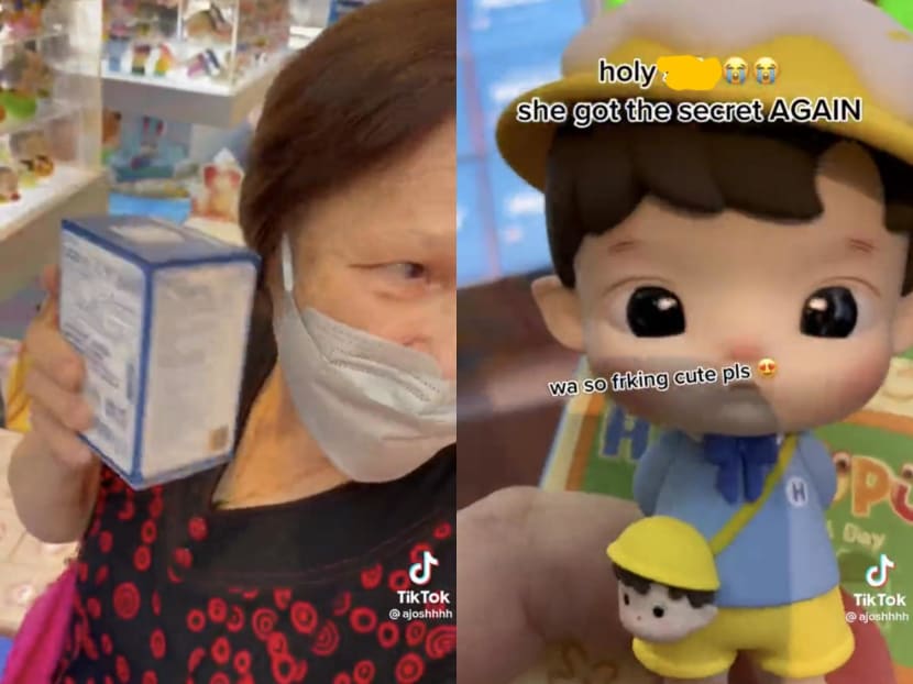 A grandmother (left) shakes a blind box close to her ears in an attempt to detect the mystery figurine within it. 