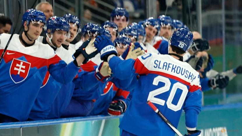 Ice hockey-Sweden overcome surprise Italy fight, Slovakia stun defending champs Finland