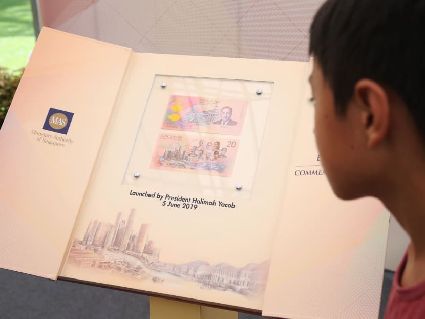 A boy looks at the Singapore Bicentennial commemorative note that was launched by President Halimah Yacob at the Istana Open House, June 5, 2019. A boy looks at the Singapore Bicentennial commemorative note that was launched by President Halimah Yacob at the Istana Open House, June 5, 2019.