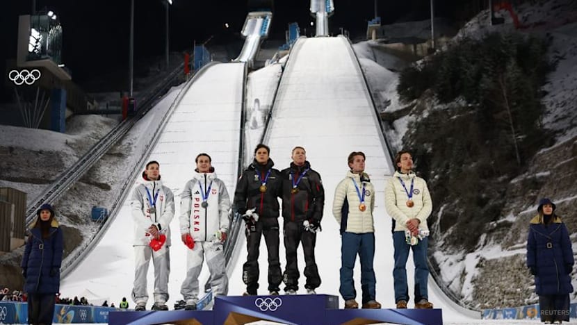 Ski jumping-Austria prevail in chaotic super team final disrupted by snow