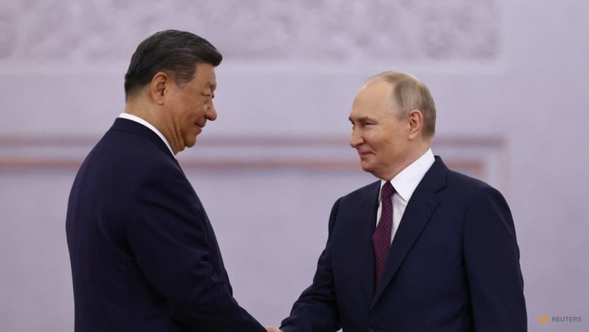 At Kremlin talks, Putin and Xi cast themselves as defenders of world order