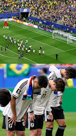 Japan team bows to fans after their World Cup elimination