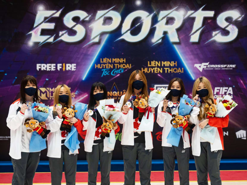 <span><span>Ms Jolene ‘Lustreless’ Poh (left most) and Team TSL clinched the silver medal in the League of Legends: Wild Rift (mobile) event for Singapore at the Hanoi SEA Games on May 18, 2022. </span></span> <span><span>Ms Jolene ‘Lustreless’ Poh (left most) and Team TSL clinched the silver medal in the League of Legends: Wild Rift (mobile) event for Singapore at the Hanoi SEA Games on May 18, 2022. </span></span>