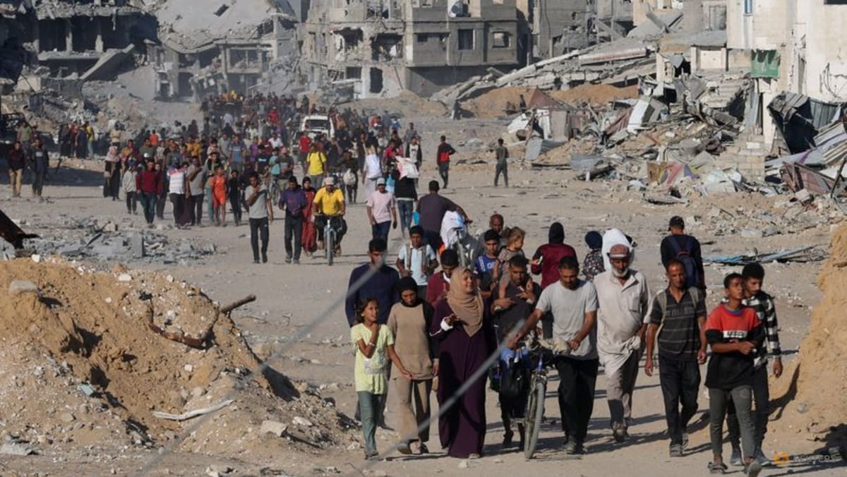 Gazans stream back home as Israel-Hamas ceasefire holds