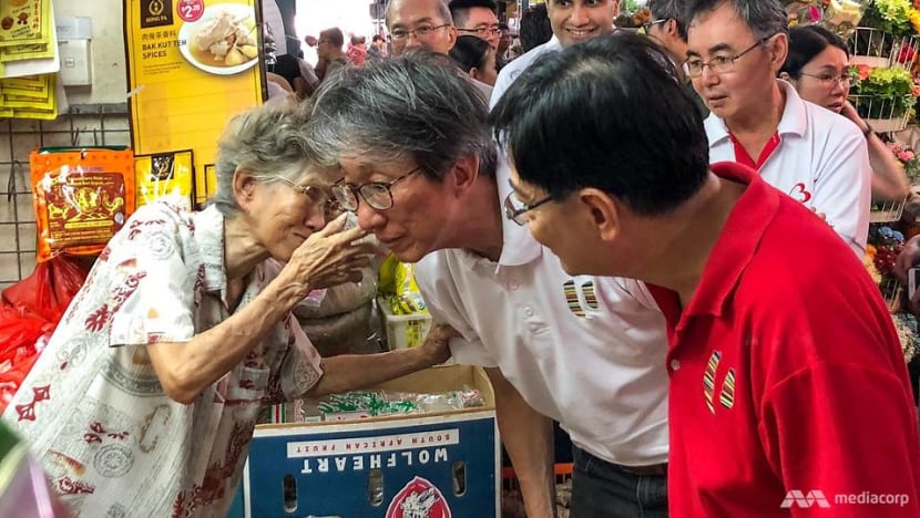 mp-lim-swee-say-and-deputy-prime-minister-heng-swee-keat-speaking-to-residents-in-bedok.jpg