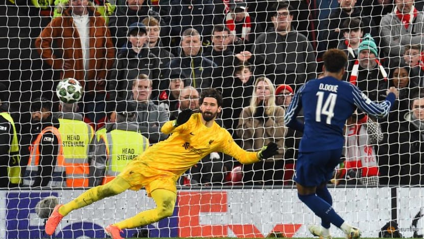 Brazil's Alisson to return to Liverpool after head injury against Colombia Brazil's Alisson to return to Liverpool after head injury against Colombia