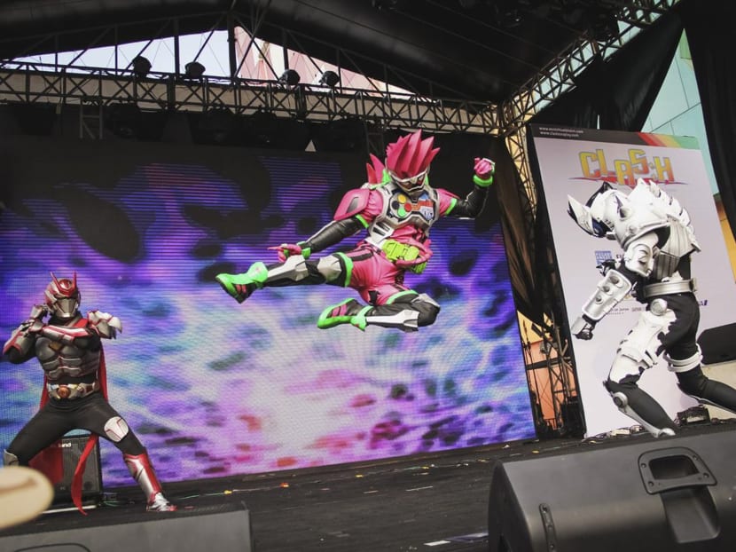 Komutoku members perform in tokusatsu costume at the Jakarta Little Tokyo Ennichisai Festival.