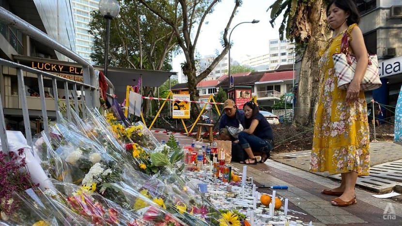 ‘I pray their souls will go to heaven’: One week after fatal Lucky Plaza accident, many come to pay respects