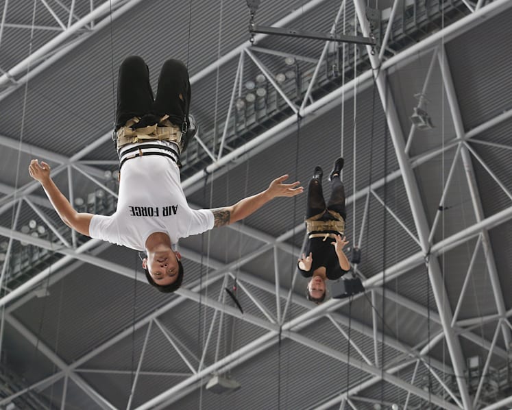 Aerialists soldier on through dizziness, discomfort during NDP practice