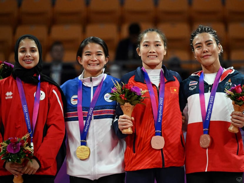 Gold medallist Philippines' Margarita Ochoa (2L), silver medallist United Arab Emirates's Balqees Abdulla (1L), bronze medallists Vietnam's Phung Thi Hue (2R) and Thailand's Pechrada Kacie pose for a photograph at a medal ceremony for Ju-jitsu women's 48kg event during the Hangzhou 2022 Asian Games in Hangzhou, China, on Oct 5, 2023. Gold medallist Philippines' Margarita Ochoa (2L), silver medallist United Arab Emirates's Balqees Abdulla (1L), bronze medallists Vietnam's Phung Thi Hue (2R) and Thailand's Pechrada Kacie pose for a photograph at a medal ceremony for Ju-jitsu women's 48kg event during the Hangzhou 2022 Asian Games in Hangzhou, China, on Oct 5, 2023.