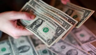 Dollar treads water as US-Iran tensions, inflation data in focus