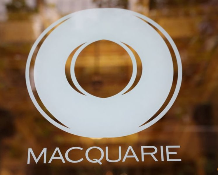 Exclusive-KKR, Macquarie in Italy-backed talks over telecoms network commercial deal, sources say