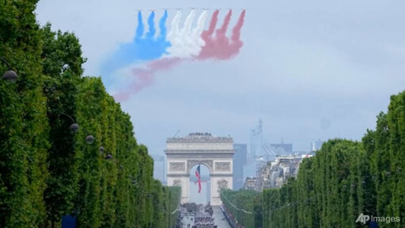 France cautiously celebrates Bastille Day, clouded by COVID-19