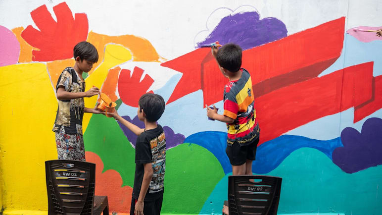 From dark alleyways to street galleries: How Indonesian youths are making their community safer