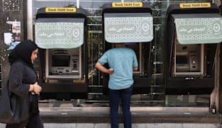 Iran says card-based banking hit by cyberattack on three lenders