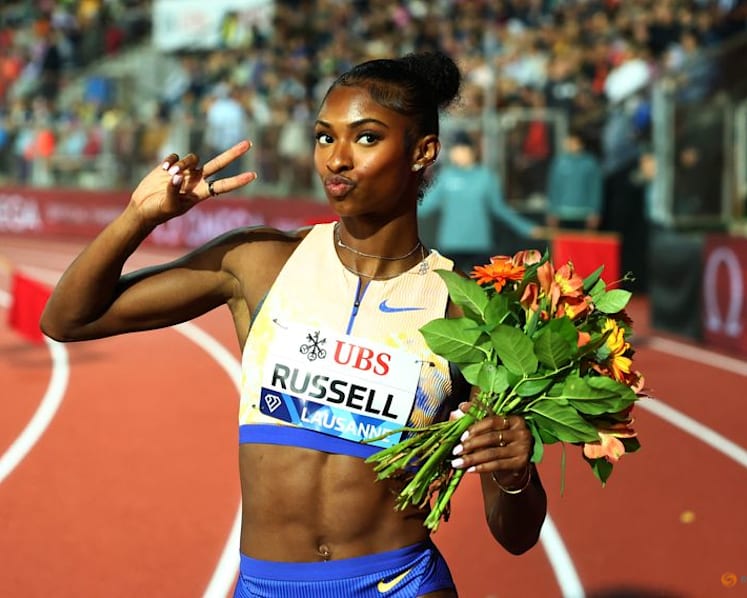 American Russell hurdles to world record in Zurich