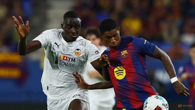 Barcelona demolish Valencia 6-0 in front of small crowd