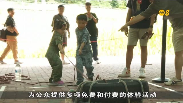 首届新防集汇嘉年华登场 互动展区展示我国国防60年发展历程