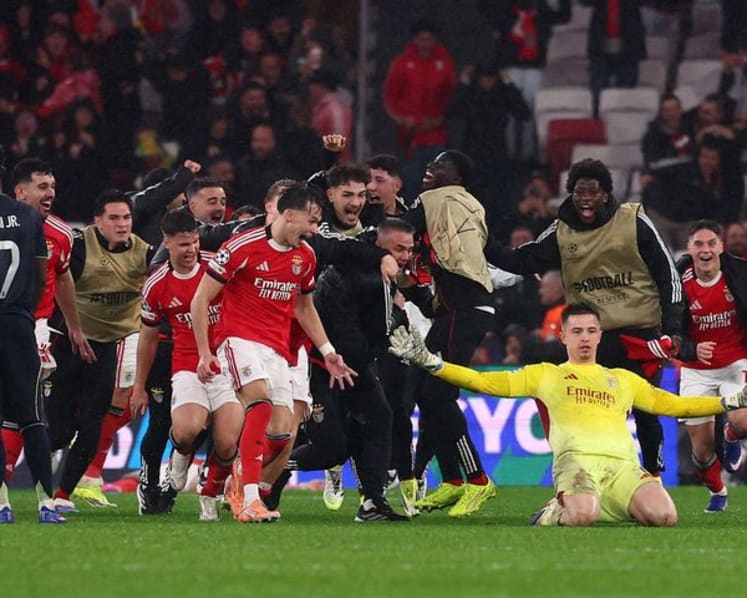 Goalkeeper scores at death to keep Benfica in Champions League with 4-2 win over Real Madrid