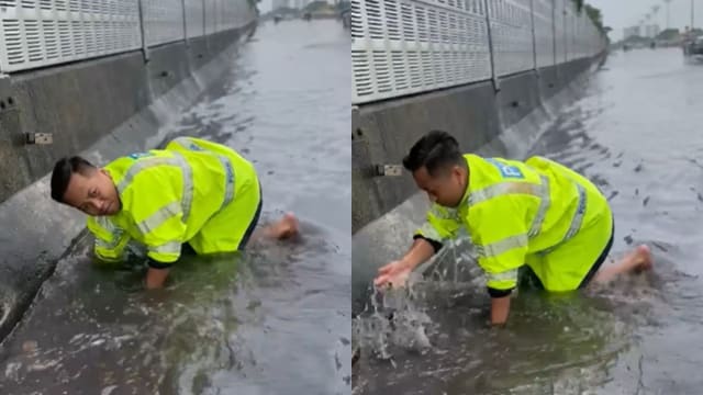 道路积水阻碍交通 马国警员徒手挖排水道疏通获赞