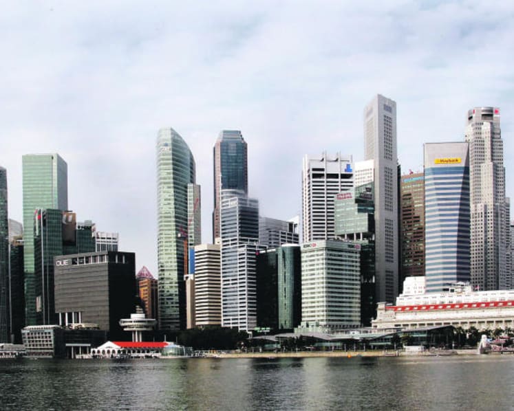 S'pore economy grows 5.2 per cent in Q3, full-year forecast raised