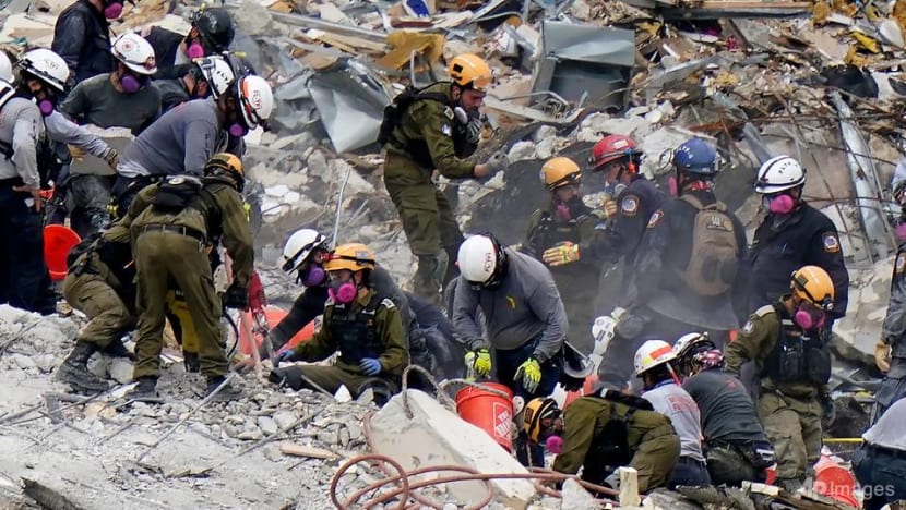 Search in Florida condominium collapse to take weeks; deaths reach 90