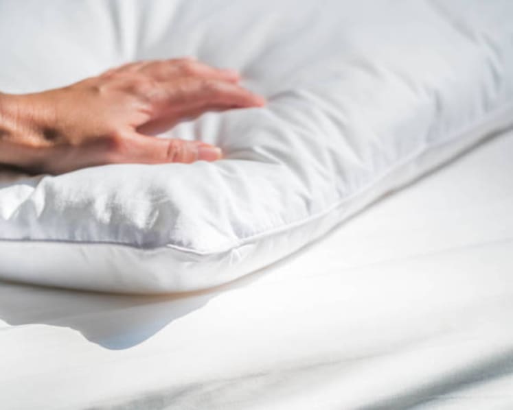 Man charged with attempting to murder his 77-year-old mother with pillow as she slept
