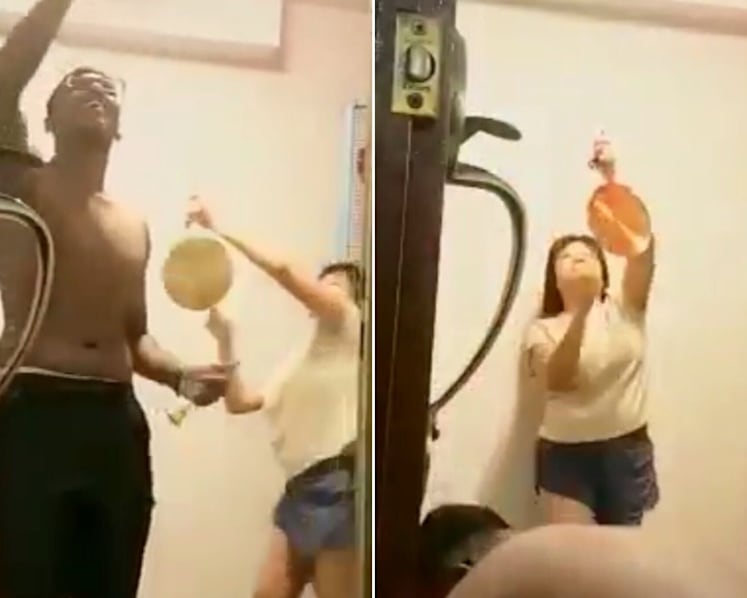 Police investigating viral video of woman banging a gong while neighbour was performing prayer ritual