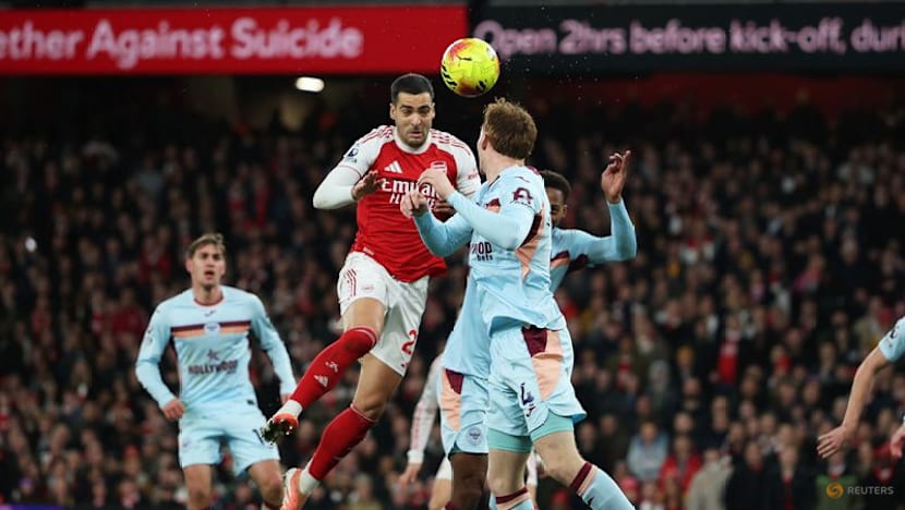 Arsenal grind past Brentford to go five points clear