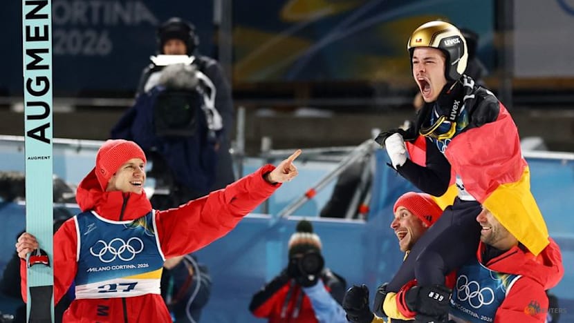 Ski Jumping-Germany's Raimund soars to gold, Slovenia's Prevc falls short