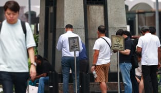 Smokers at a designated smoking point in Orchard Road on Sept 19, 2024. 