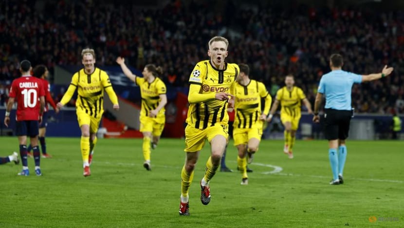 Second-half comeback sends Dortmund into Champions League quarters again