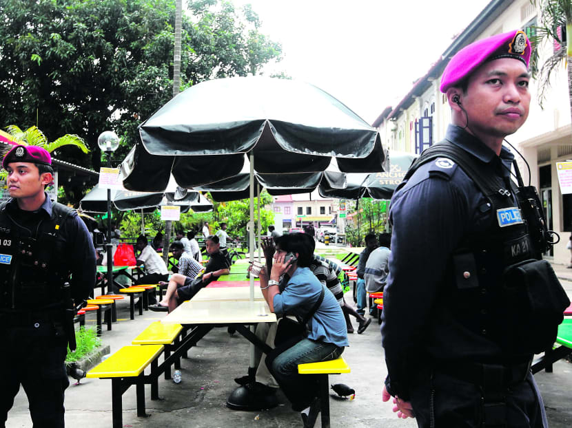 Police officers patrolling at Little India on Dec 15, 2013. Photo: Don Wong