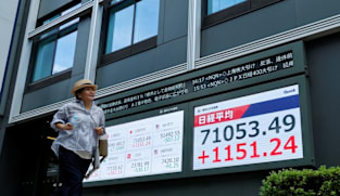 Japan, South Korea stocks hit records as oil prices fall