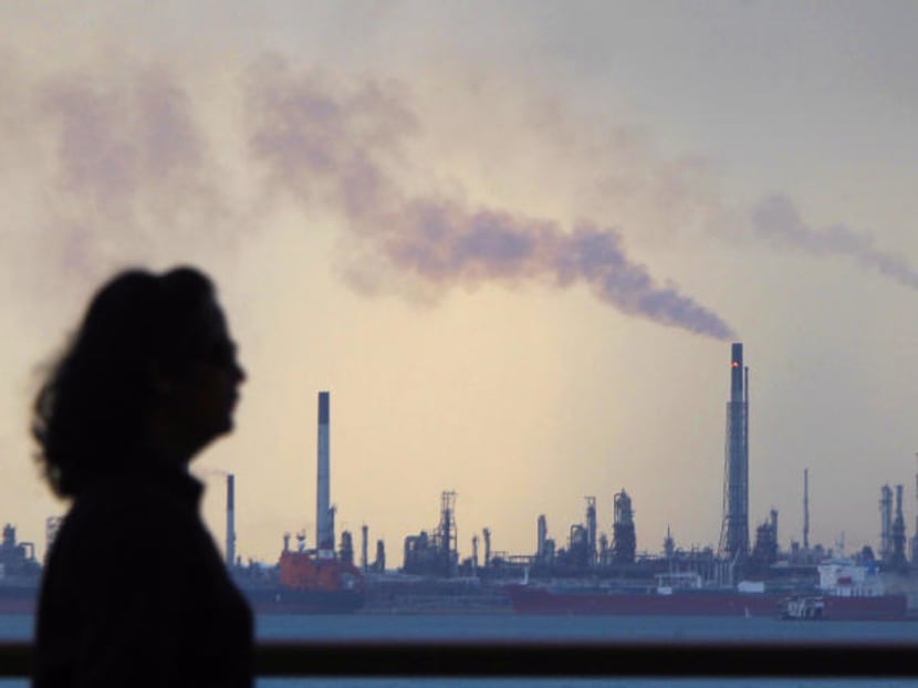 Singapore is looking to charge large emitters such as power stations between S$10 and S$20 per tonne of greenhouse gases emitted.  Photo: TODAY file photo