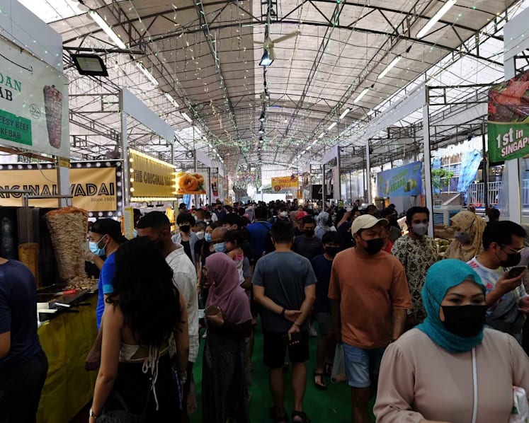 Crowds throng Ramadan bazaars after two-year hiatus; jubilant mood despite smaller scale