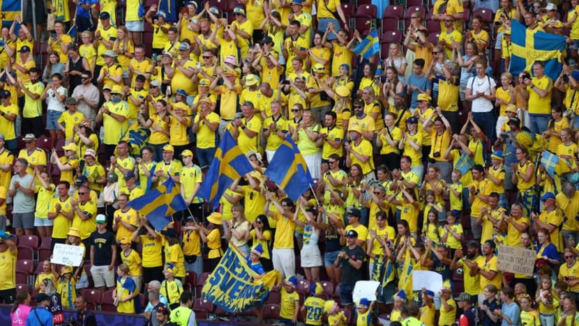 Heat wilts players but not fans' spirit at Sweden-Denmark Euros clash Heat wilts players but not fans' spirit at Sweden-Denmark Euros clash