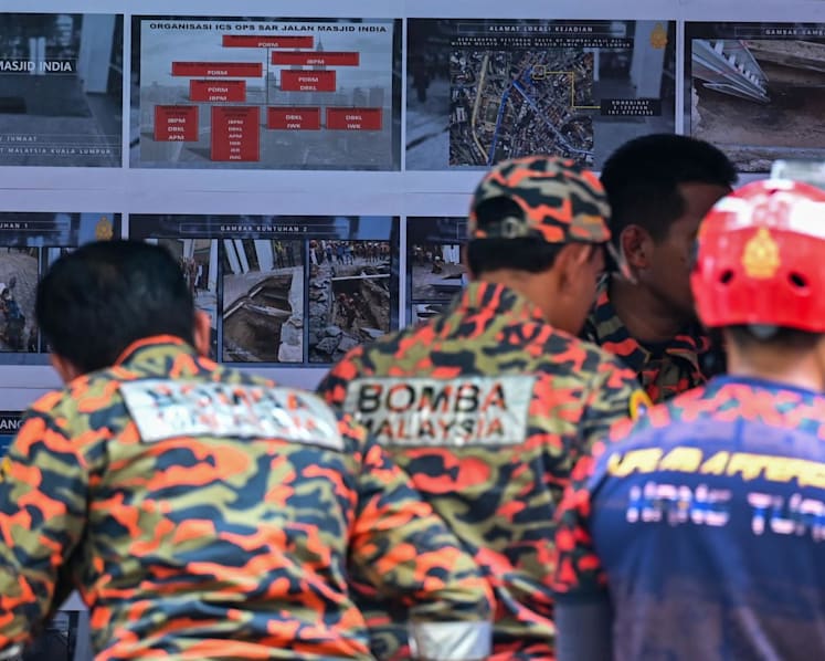 Kuala Lumpur cancels Merdeka eve celebration out of respect for sinkhole victim; police chief says no need to declare area unsafe