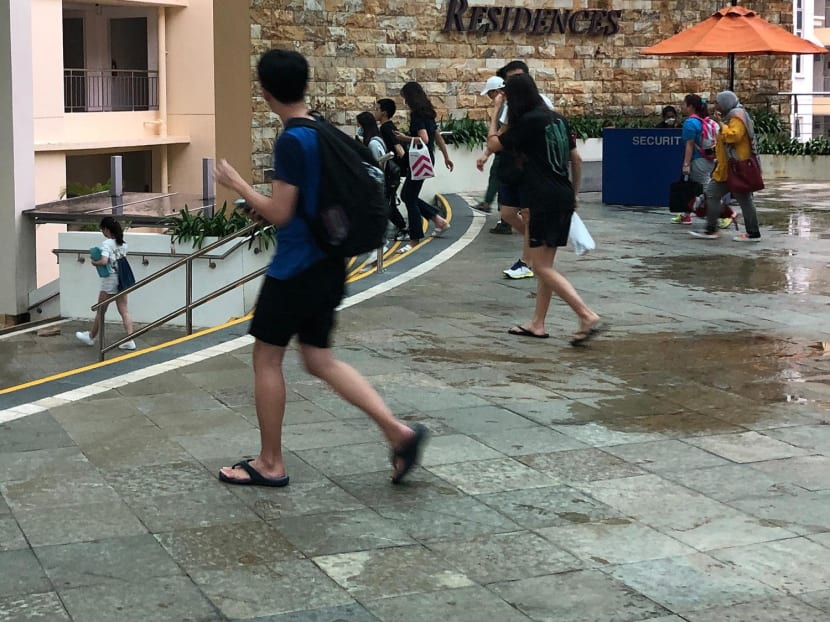 Students walking towards campus residence halls at the National University of Singapore. Students walking towards campus residence halls at the National University of Singapore.