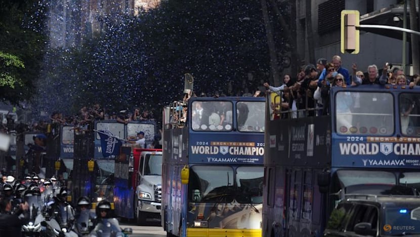 Baseball-Ohtani teases 'three-peat' as Dodgers parade draws Los Angeles crowds