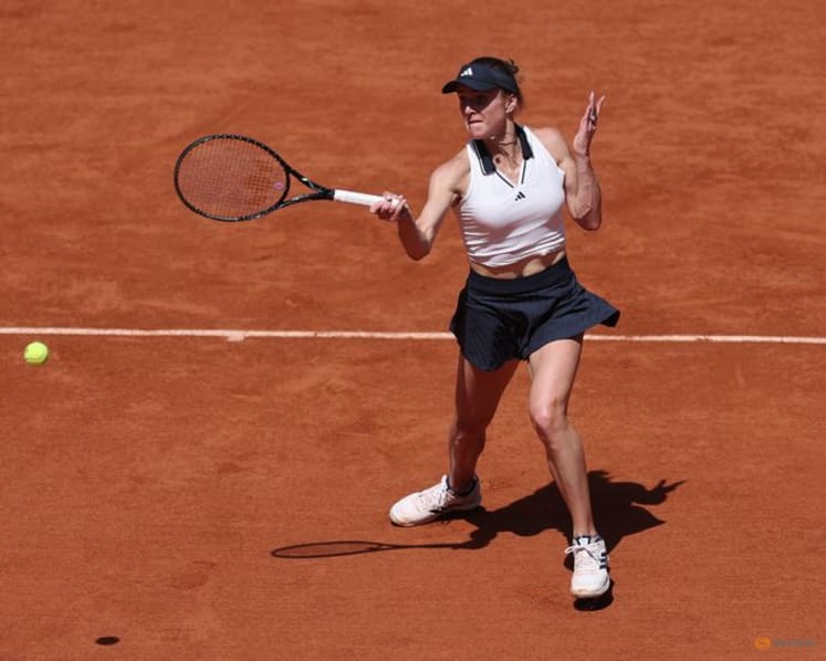 Svitolina huffs and puffs into French Open round two
