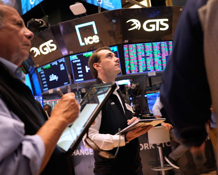 Stocks climb as oil retreats, Fed calms inflation fears