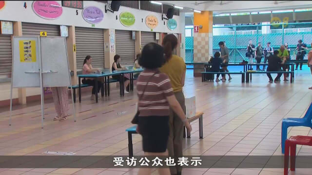 【GE2025】不少选民一大清早冒着大雨赶到明智小学投票