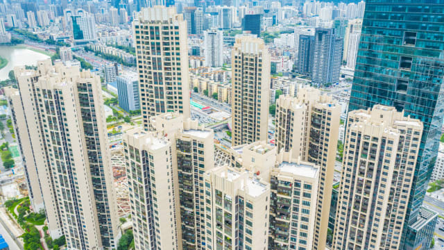 中国调低现有房贷利率 提振房产市场