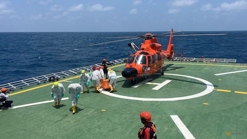Death toll from capsized ship in Indonesia rises to 20 as search continues for 115 missing passengers
