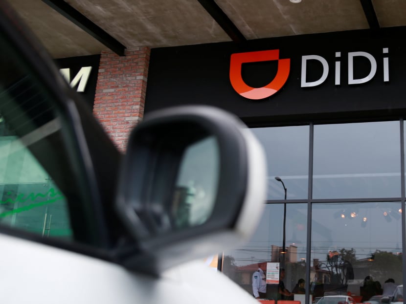 The logo of Chinese ride-hailing firm Didi Chuxing is seen at their new drivers centre in Toluca, Mexico. The company believes it has a secret weapon when it comes to conquering other developing markets: its knowledge of congested cities.