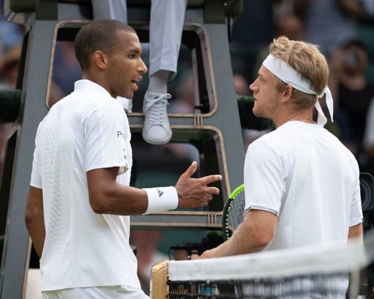 Auger-Aliassime labels injury rule a disgrace after stormy win