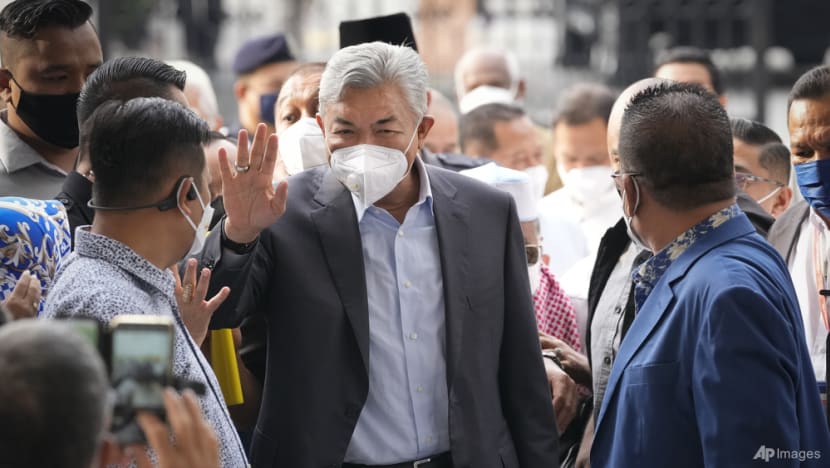 UMNO president Ahmad Zahid ordered to enter defence on corruption, money laundering charges